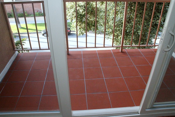 Large balcony with imported Terra Cotta tile and ocean view