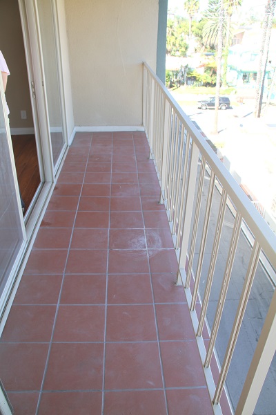  Large Balcony off Living room with Terra Cotta tile and city lights view