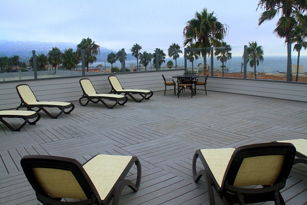 1400 sq. ft roof deck with stunning ocean views and sunsets available to all residents