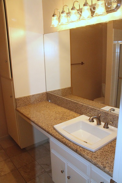 Large second bedroom with granite and Travertine