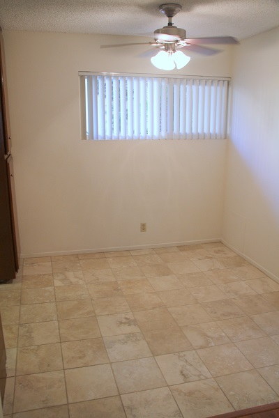 Dining room with Travertine Marble tile