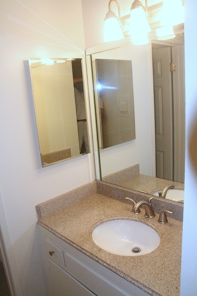 Upgraded bathroom with imported granite Counter and Travertine Marble Floor